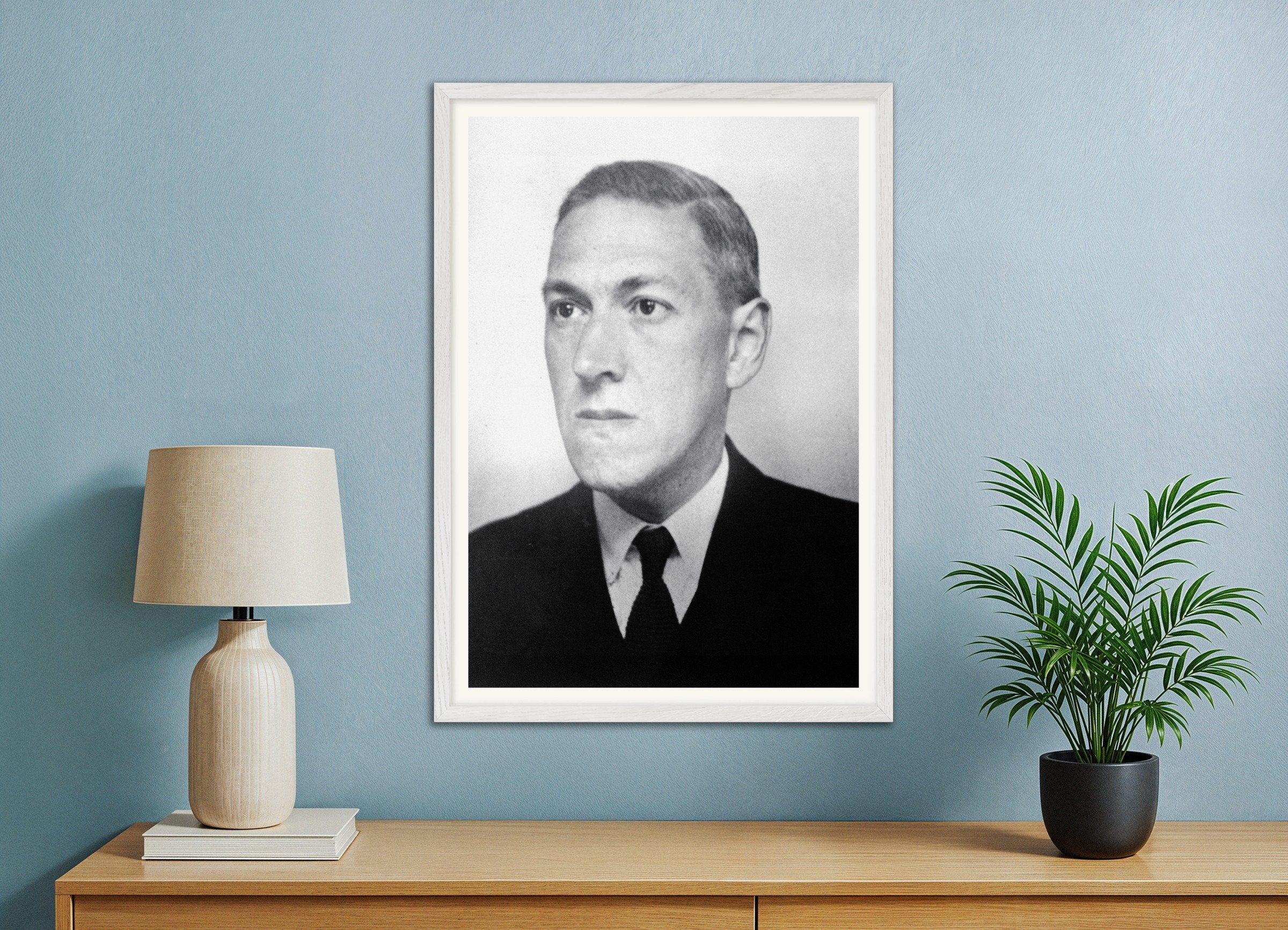 Poster of "I Am An Outsider" H.P. Lovecraft Portrait Quote Print, with white wooden frame