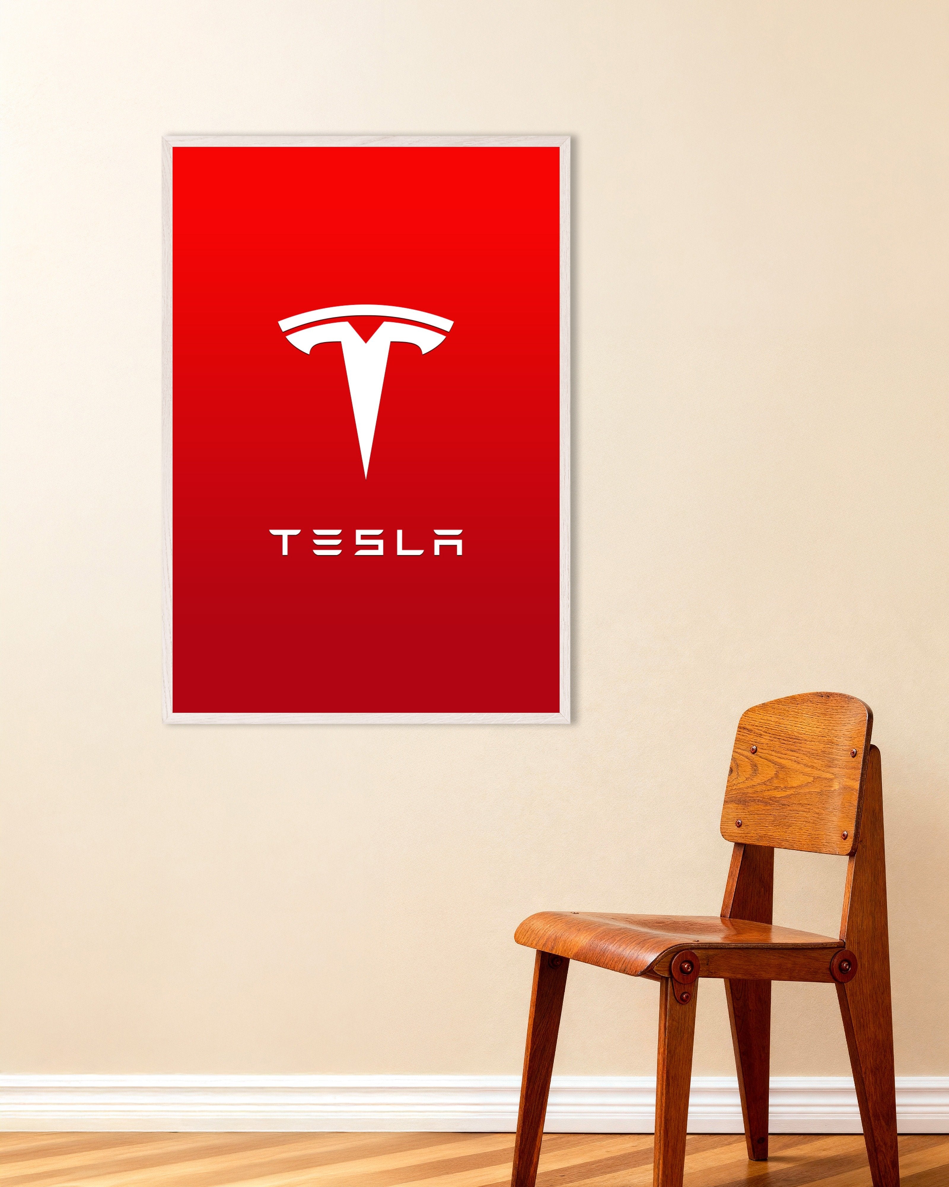 Poster of Tesla logo, with white wooden frame