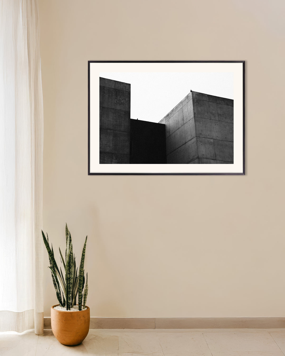 Poster ”Två betongblock och en fågel”, med metallram